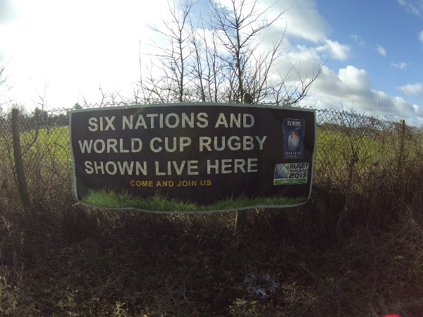 Sign on farm fence