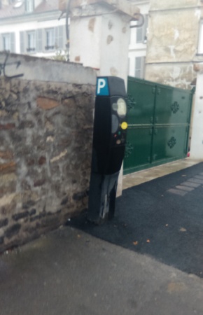 All through the night, every time I saw this 'pay and display' parking machine, I thought it was a man peeing against the wall.  Daylight confirmed that it wasn't.