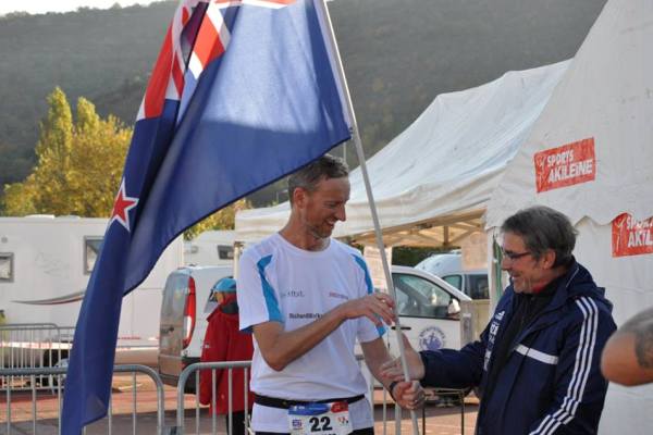 About to shake hands with race organiser, Gerard Cain, after breaking the NZ 500km record