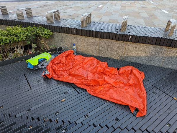 Sleeping outside the Liverpool Railway Station